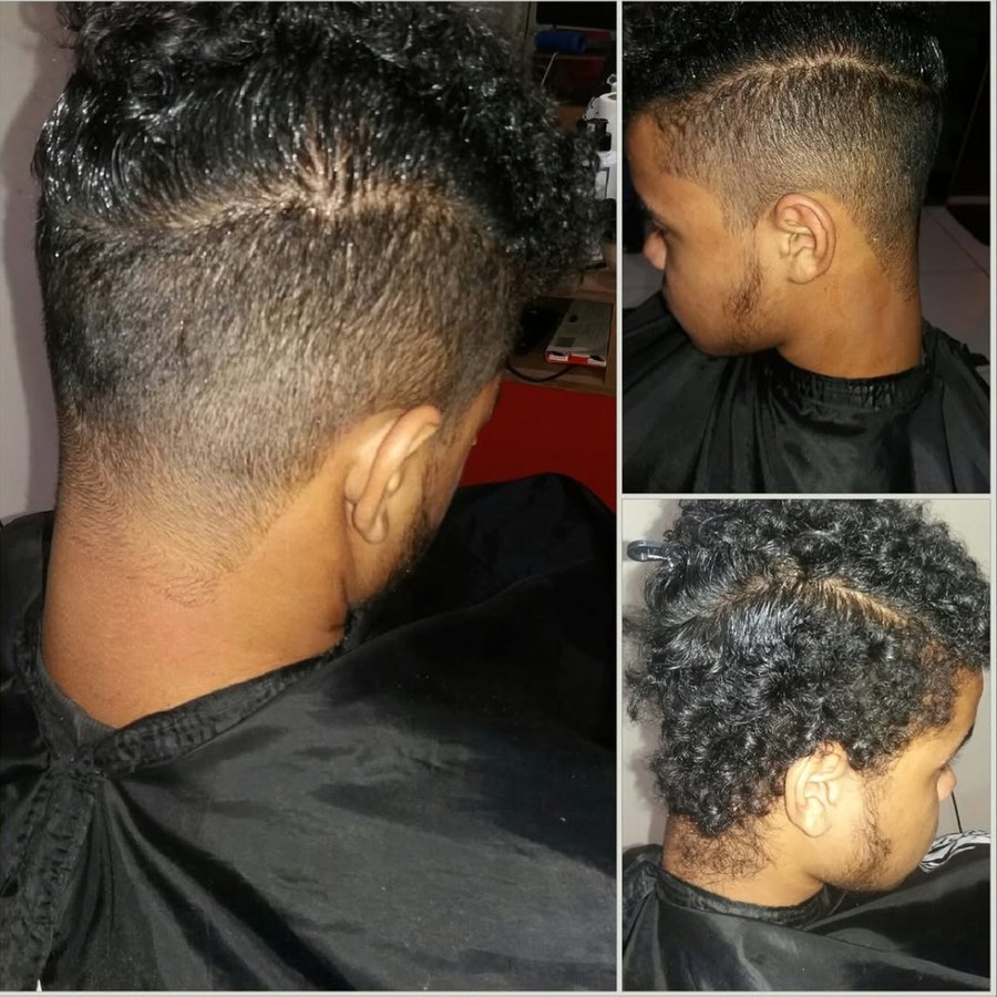 Corte em cabelo cacheado com degradê nas laterais